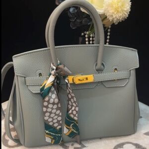 Elegant Grey Handbag with Gold Accents